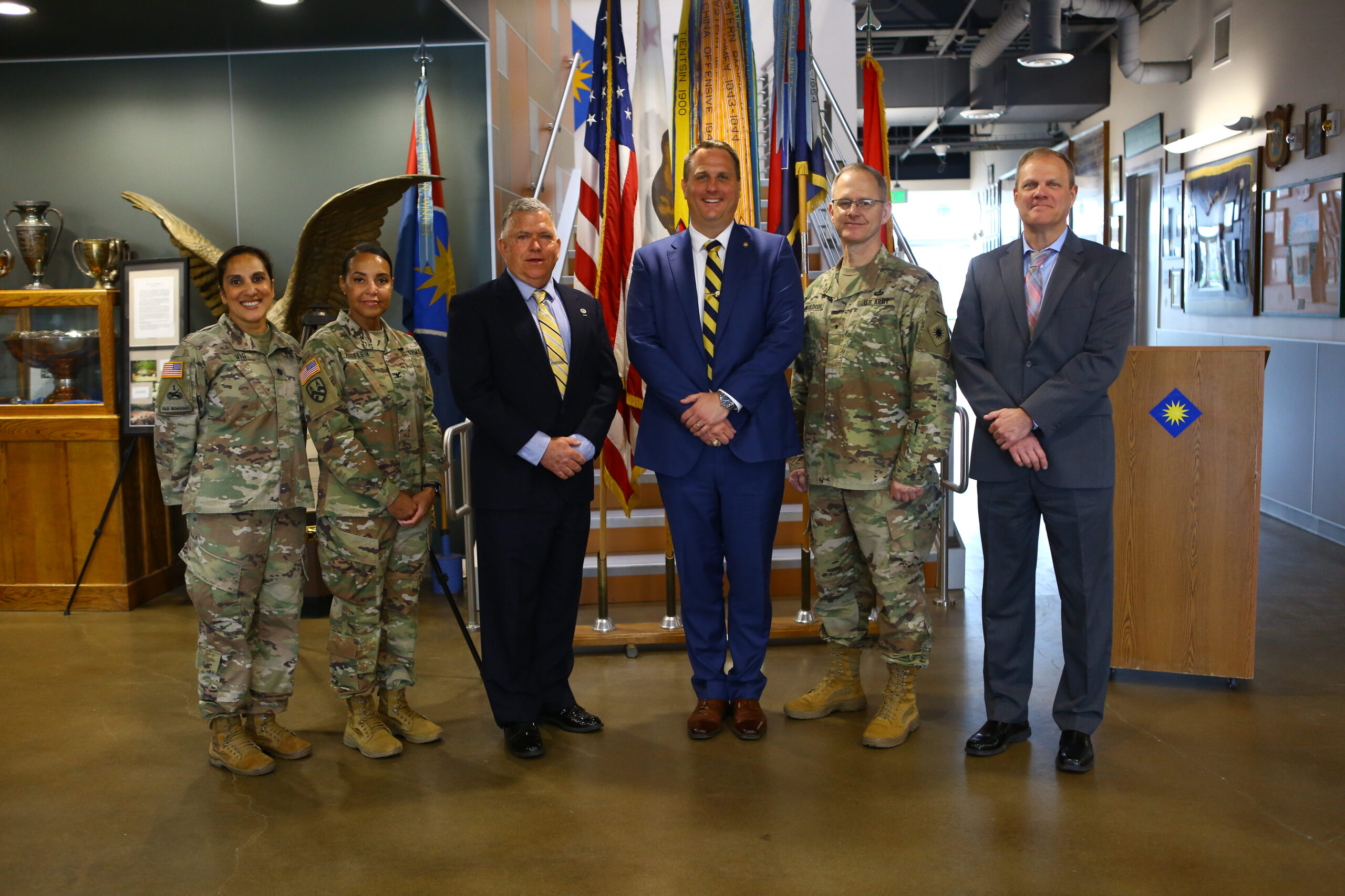 From left: U.S. Army Lt. Col. Manju Vig, garrison commander of Joint Forces Training Base, Los Alamitos; Col. Robin Hoeflein, chief of staff of the 40th Infantry Division, California Army National Guard; John Arbogast, California state director for the Selective Service System, Joel Spangenberg, Selective Service System acting director, Brig. Gen. Robert Wooldridge, 40th Infantry Division deputy commanding general, and Steven Kett, Selective Service System Region III manager, stand for a group photo in the 40th Infantry Division headquarters following Arbogast’s swearing in ceremony